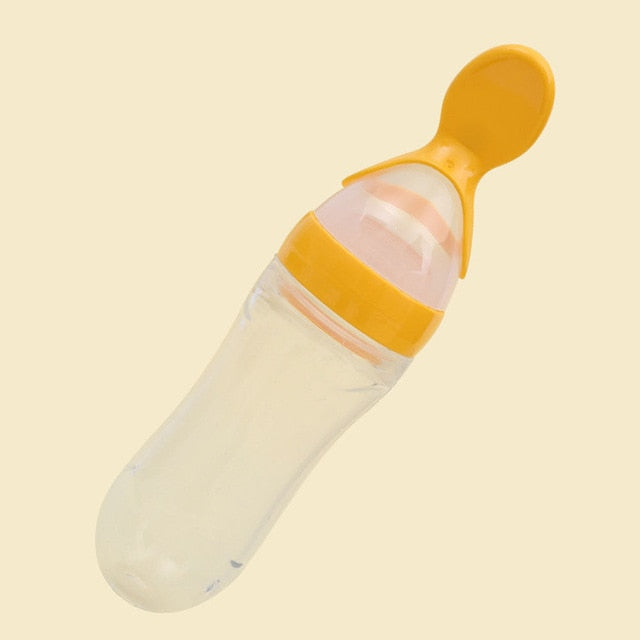 Infant Baby Squeezing Feeding Bottle With Spoon